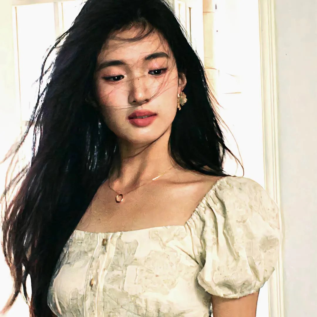 彼女